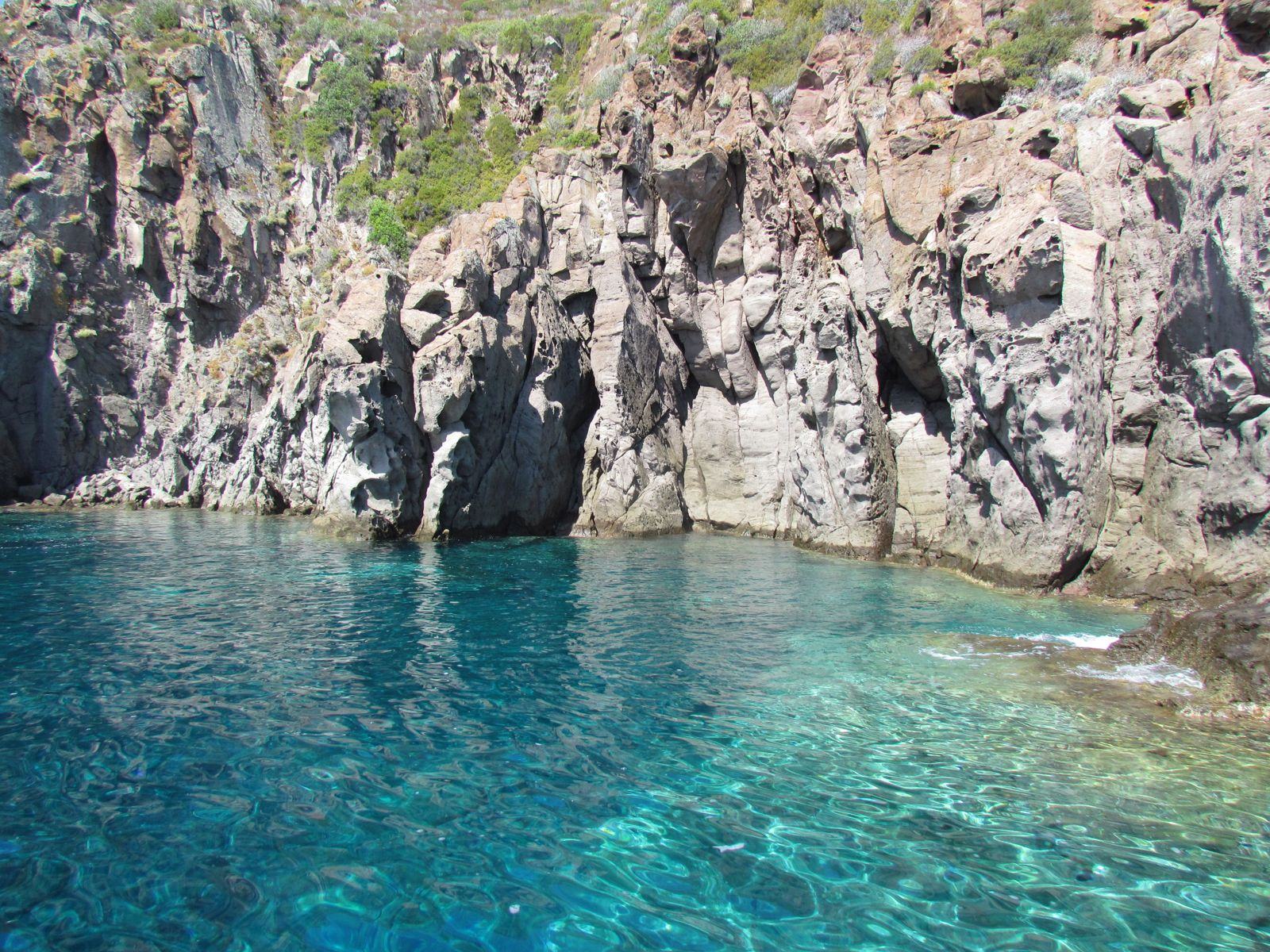 Turquoise water in a cove on Capraia