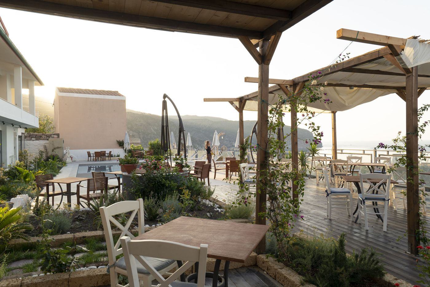 Tables under the pergola at Saracino Pane & Vino